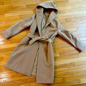 Long jacket with tie belt and hood. Never worn.